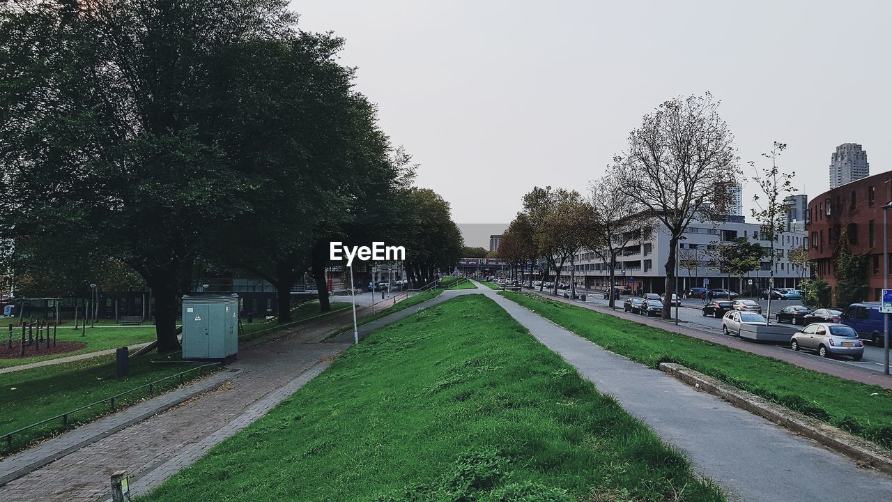 ROAD IN CITY AGAINST SKY