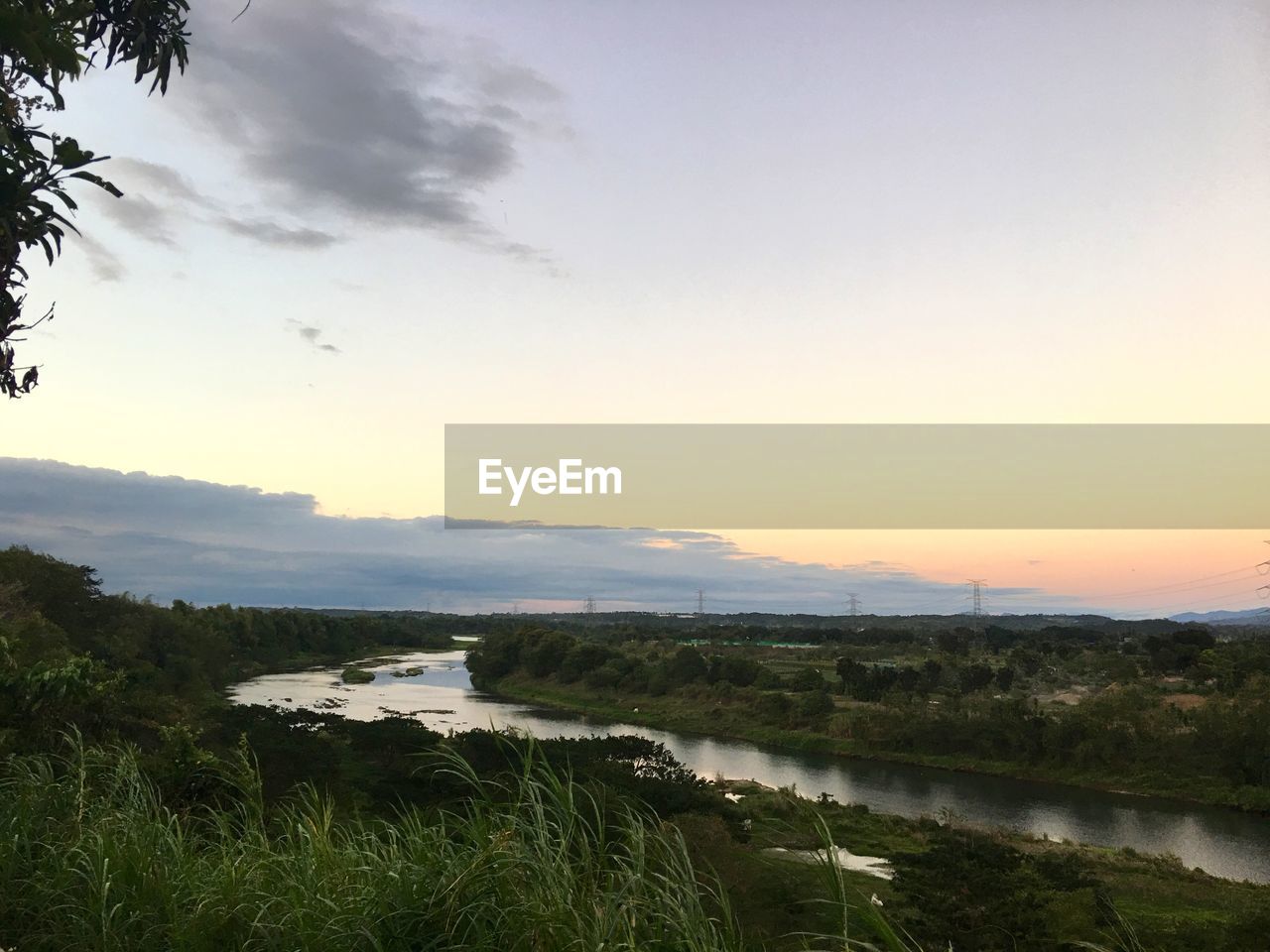 VIEW OF LANDSCAPE AGAINST SKY DURING SUNSET