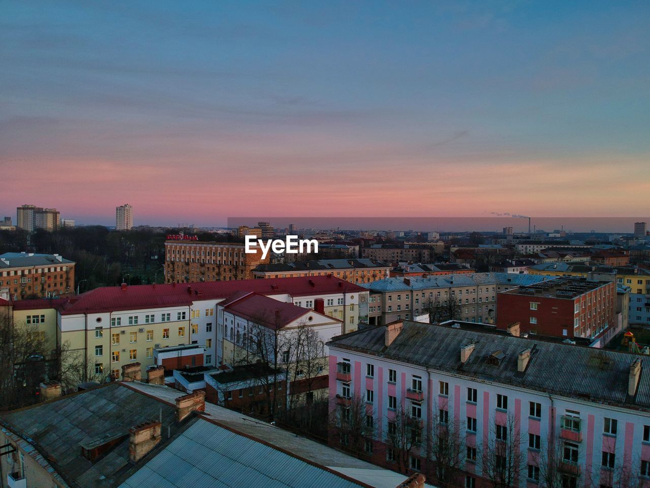 High angle view of townscape against sky during sunset