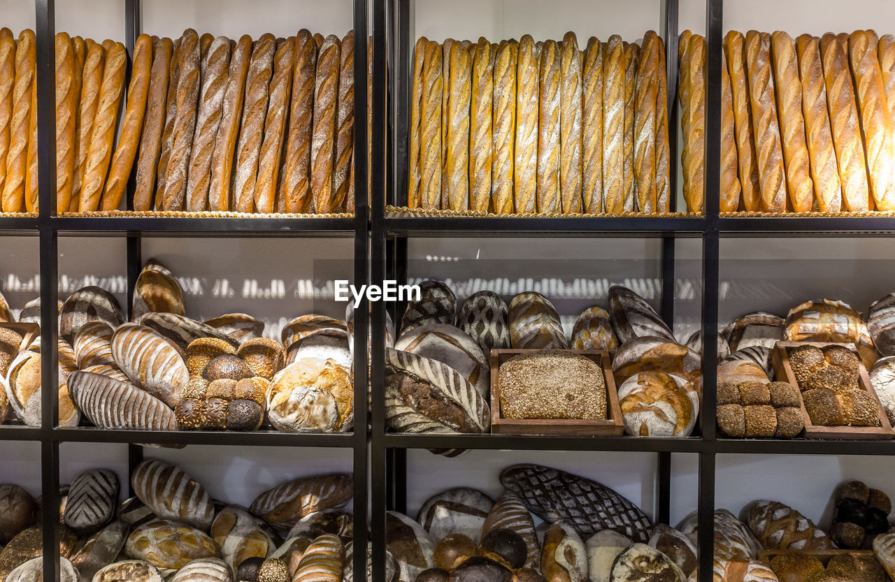 Close-up of baked breads in bakery