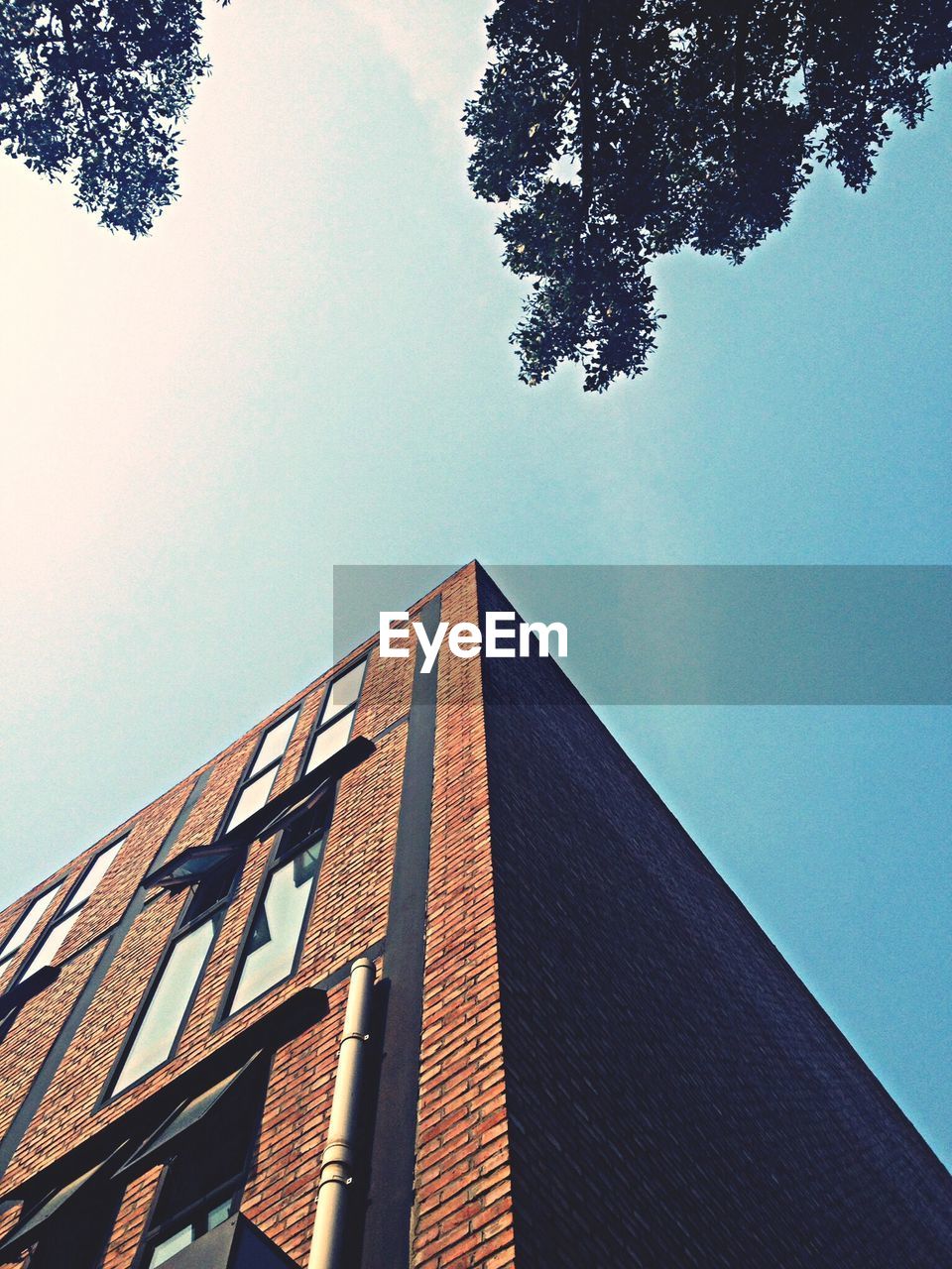 Low angle view of residential building against clear sky