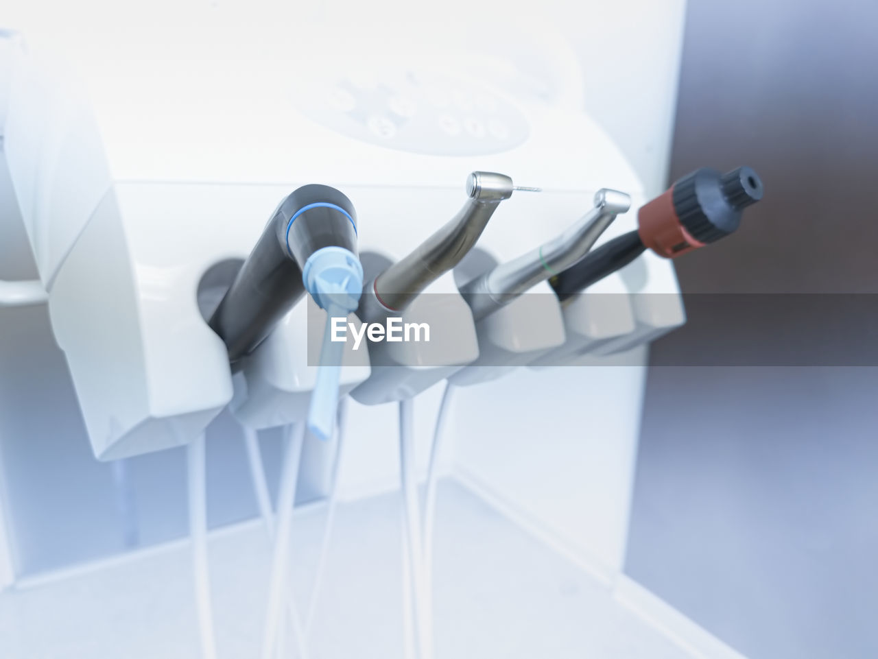 Closeup of dentist drill and other professional instruments in dentist's office