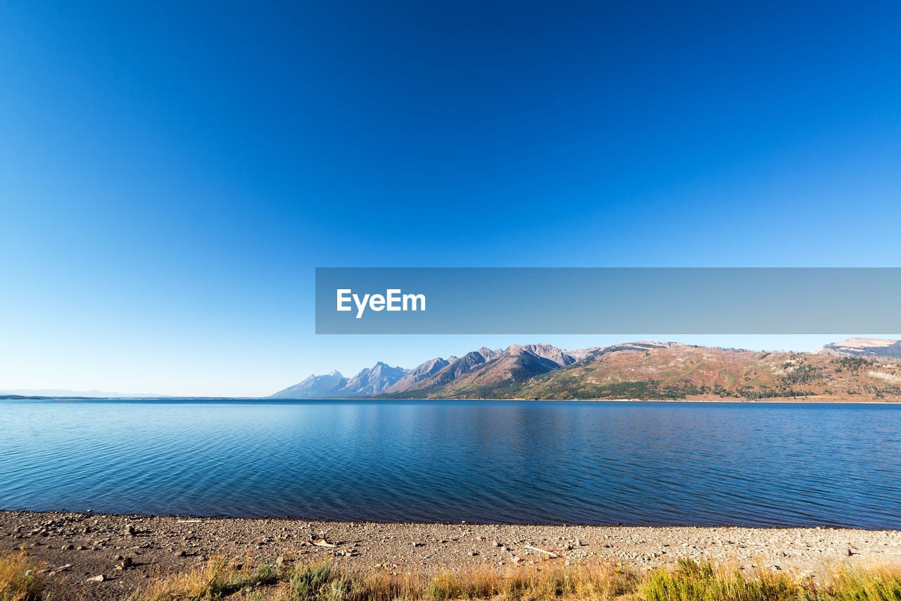 Wide angle view of jackson lake and teton range in grand teton national park