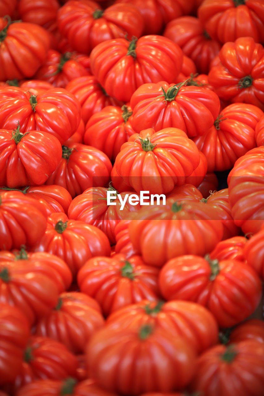 Full frame shot of tomatoes for sale at market stall