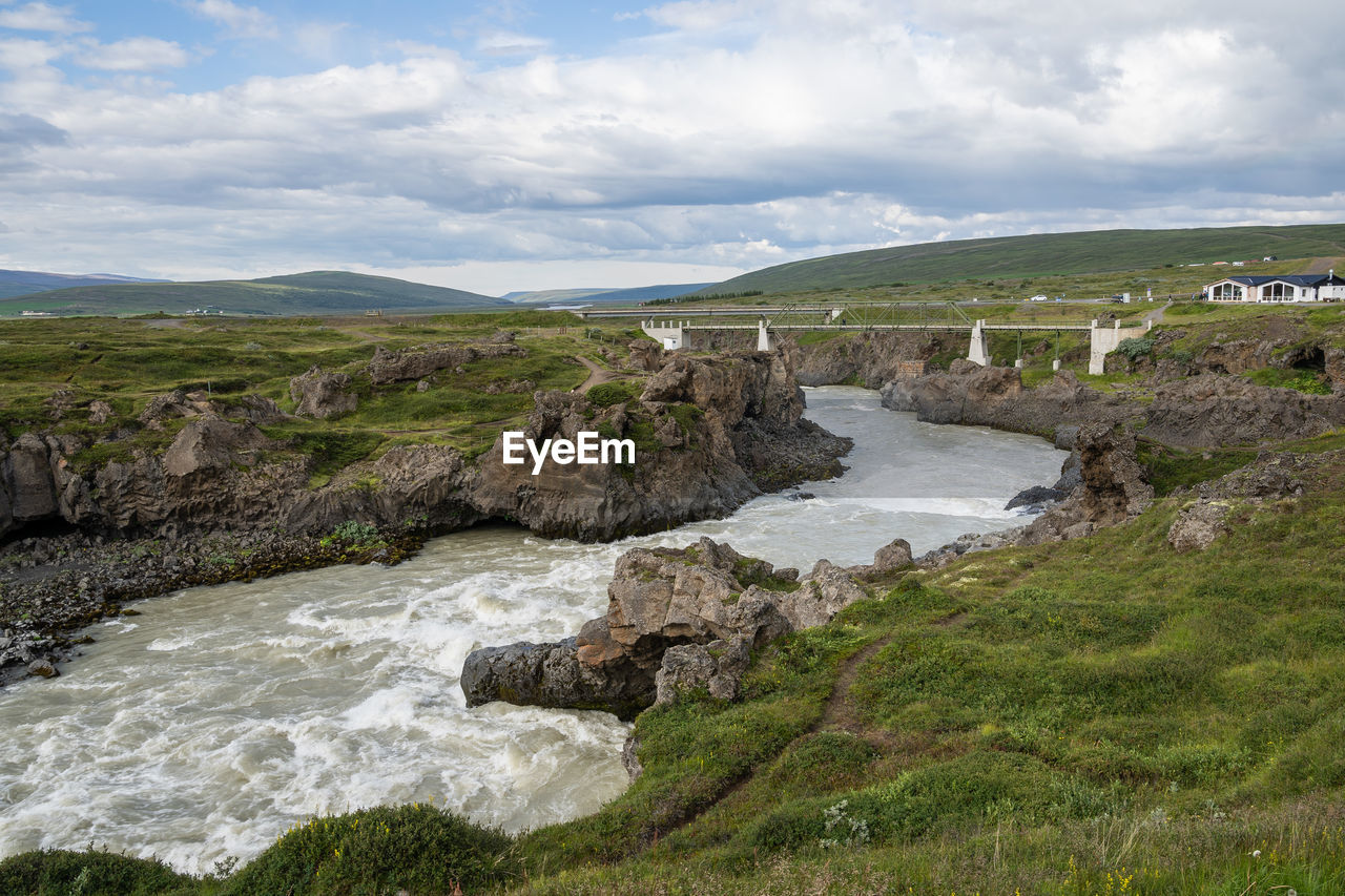 Scenic view of river against sky