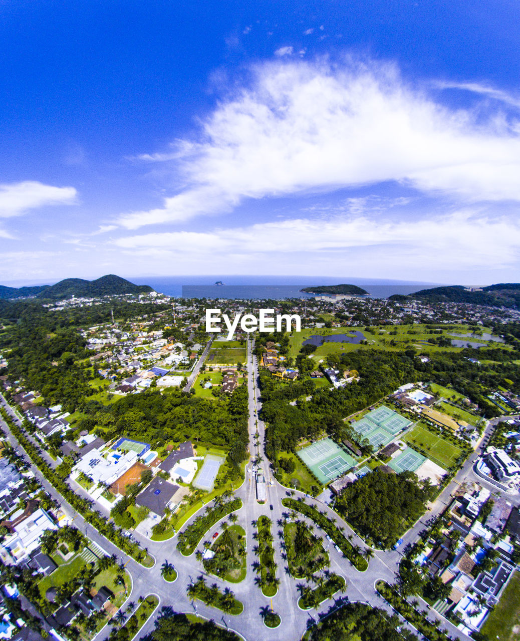 Aerial view of cityscape against sky