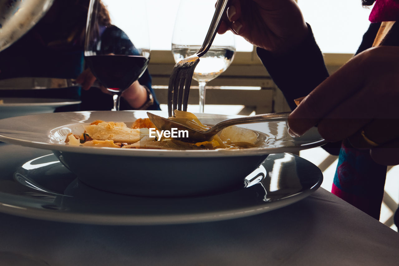 CLOSE-UP OF SERVED FOOD ON TABLE