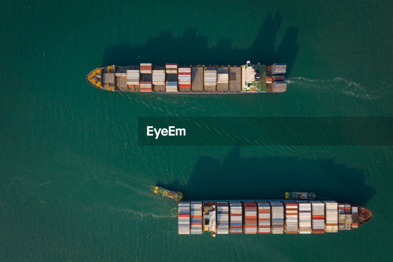 Aerial top view from drone, container ship or cargo shipping business logistic import and export 