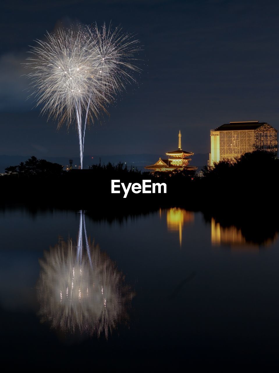 FIREWORK DISPLAY OVER WATER