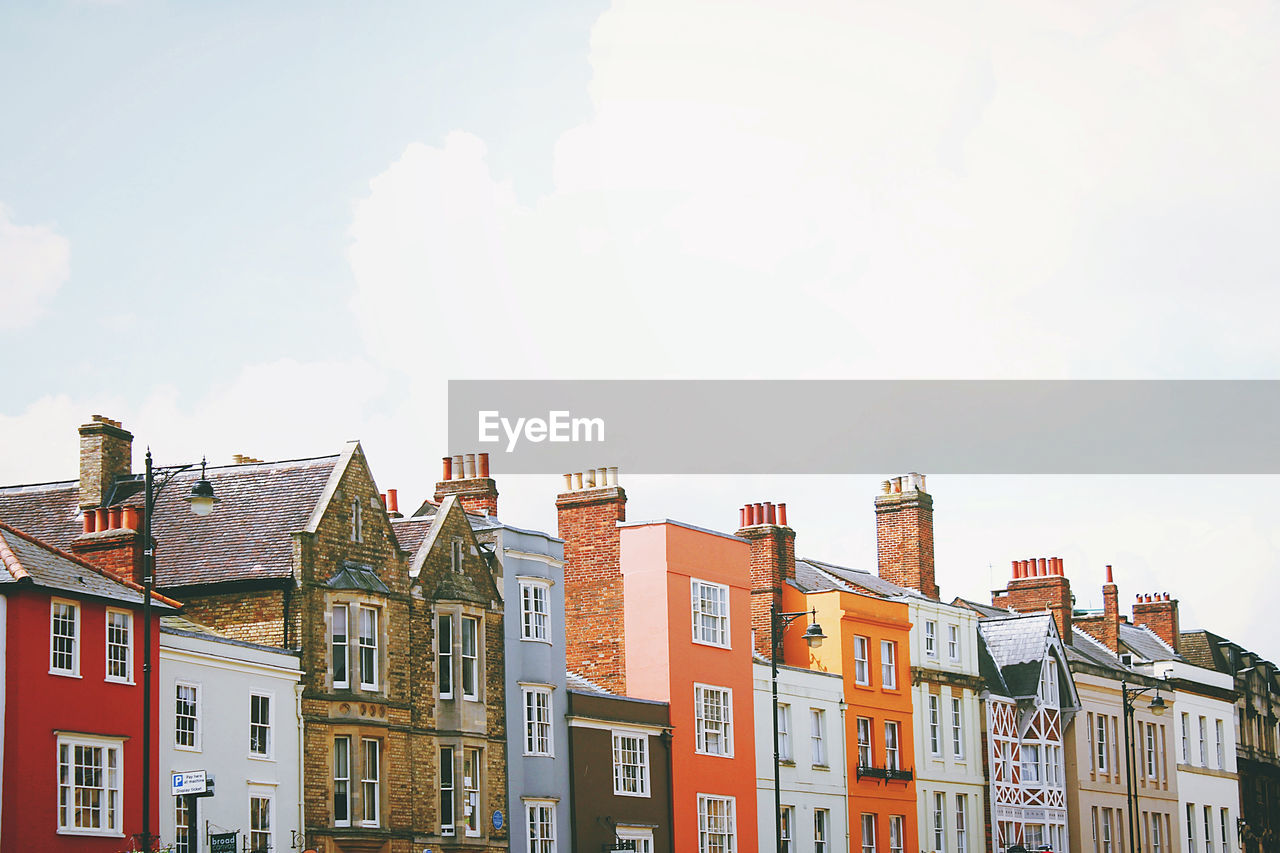 Low angle view of residential buildings against sky