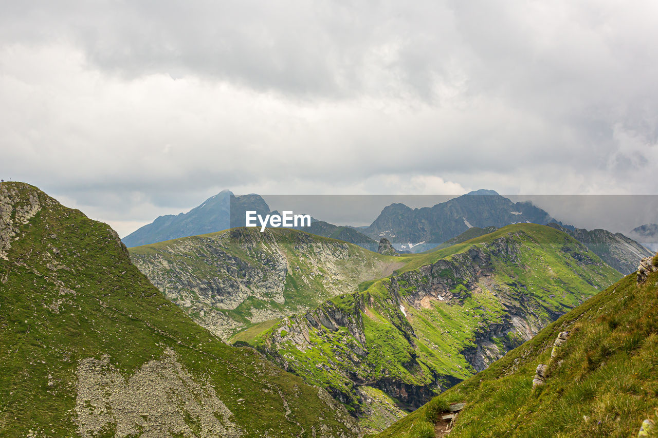 SCENIC VIEW OF MOUNTAIN AGAINST SKY