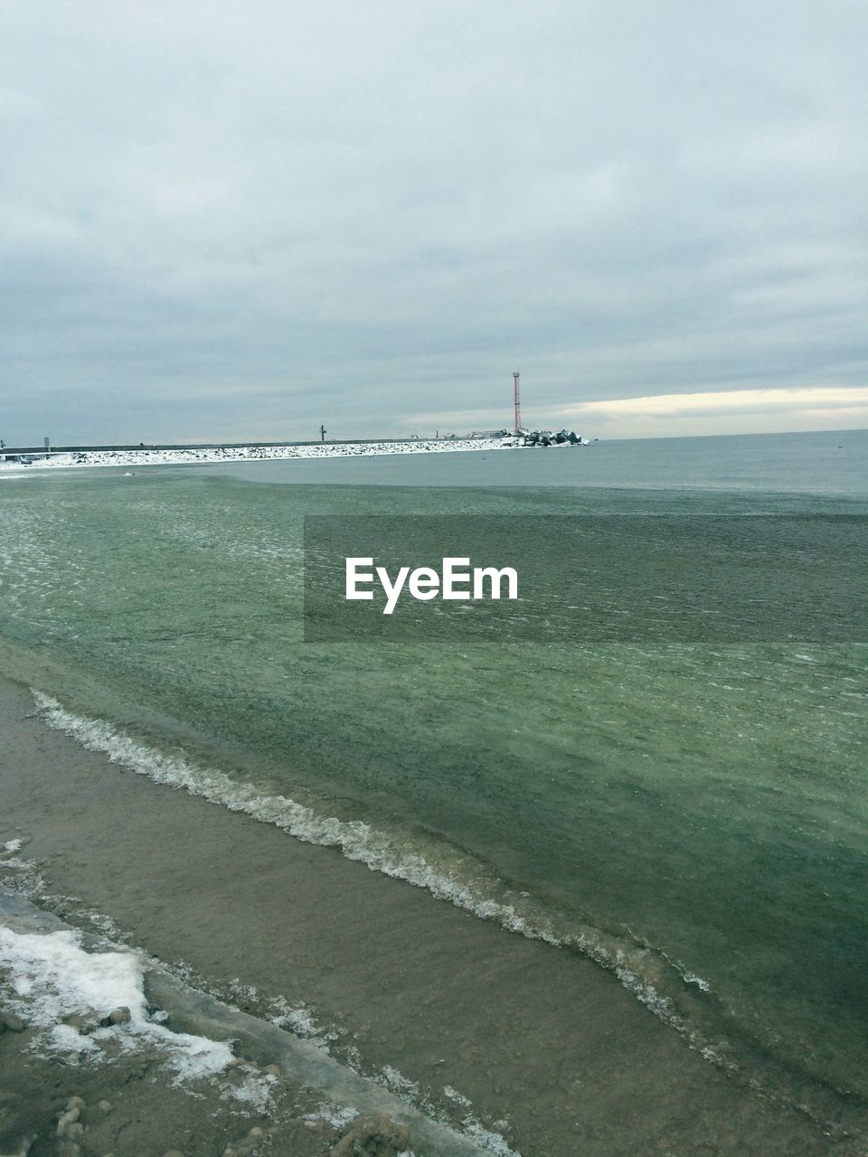 VIEW OF BEACH AGAINST SKY