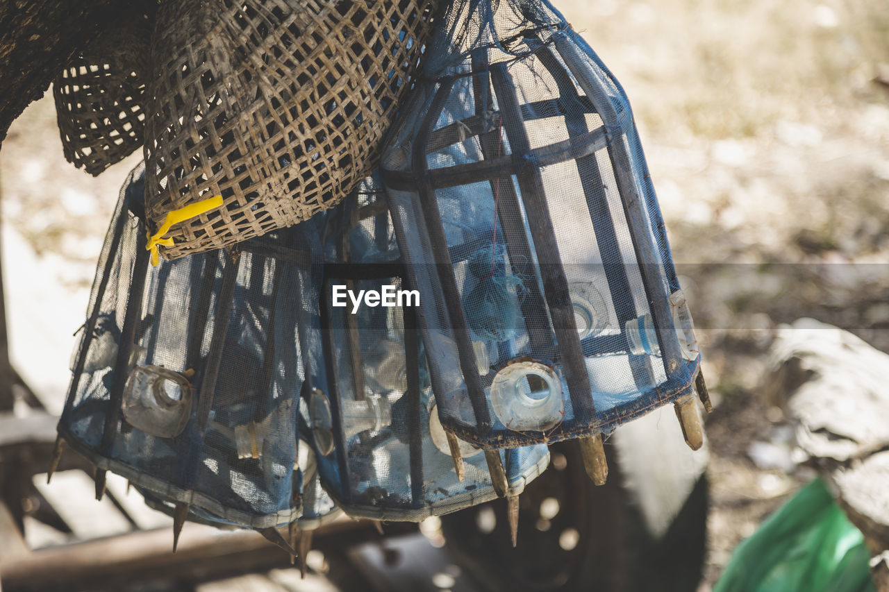 Close-up of fishing tackles hanging outdoors