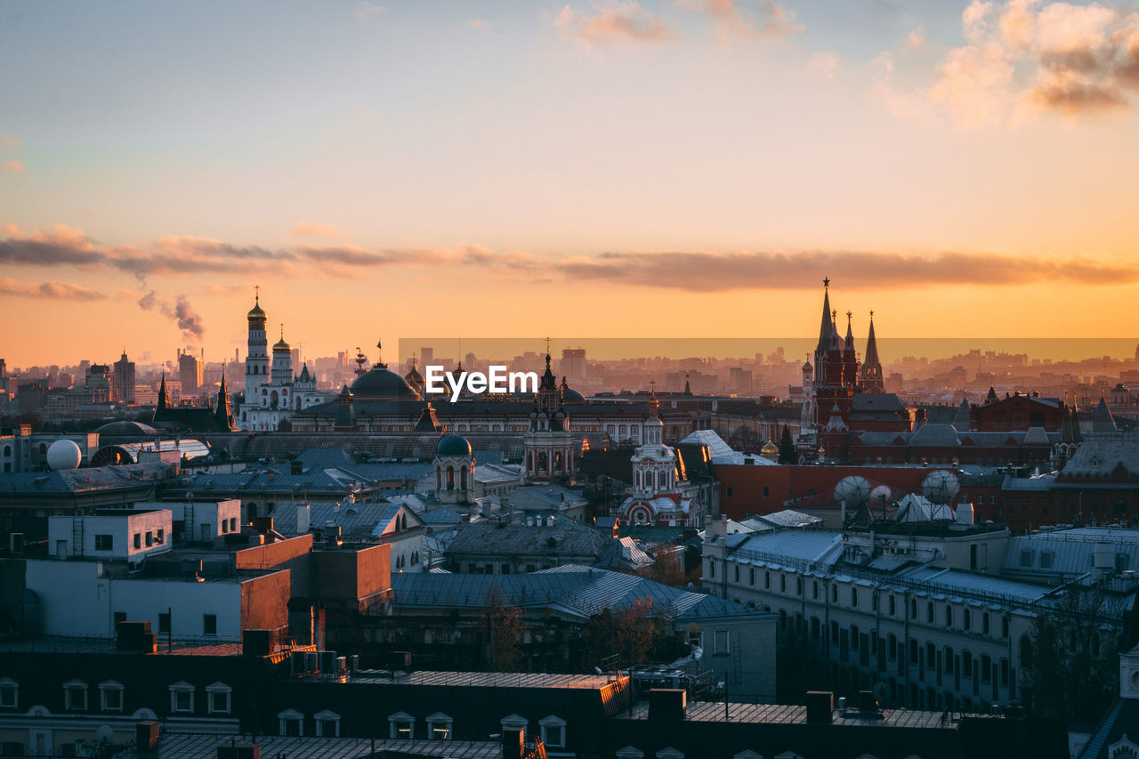 View of cityscape against sky during sunset