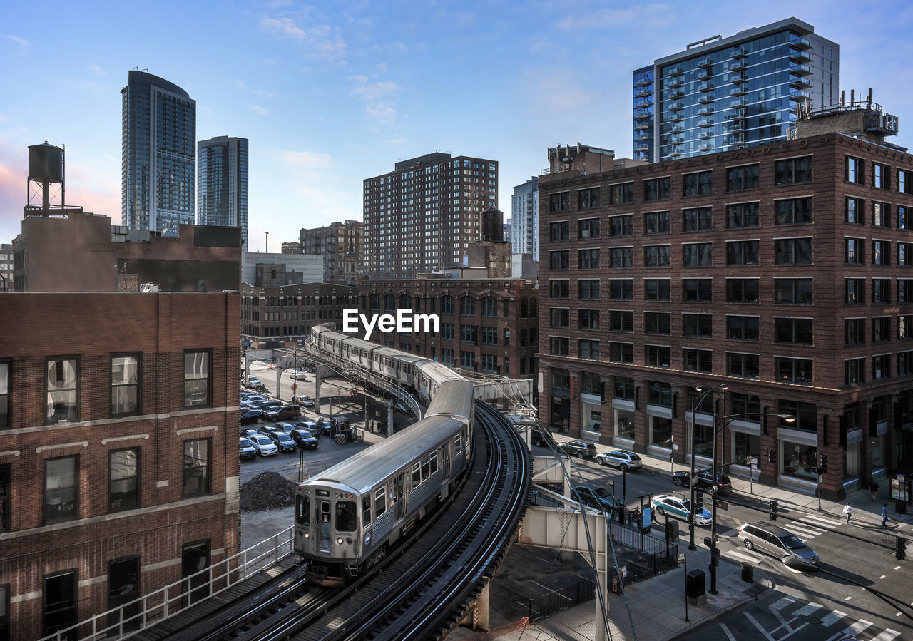 High angle view of railroad tracks amidst buildings in city chicago 