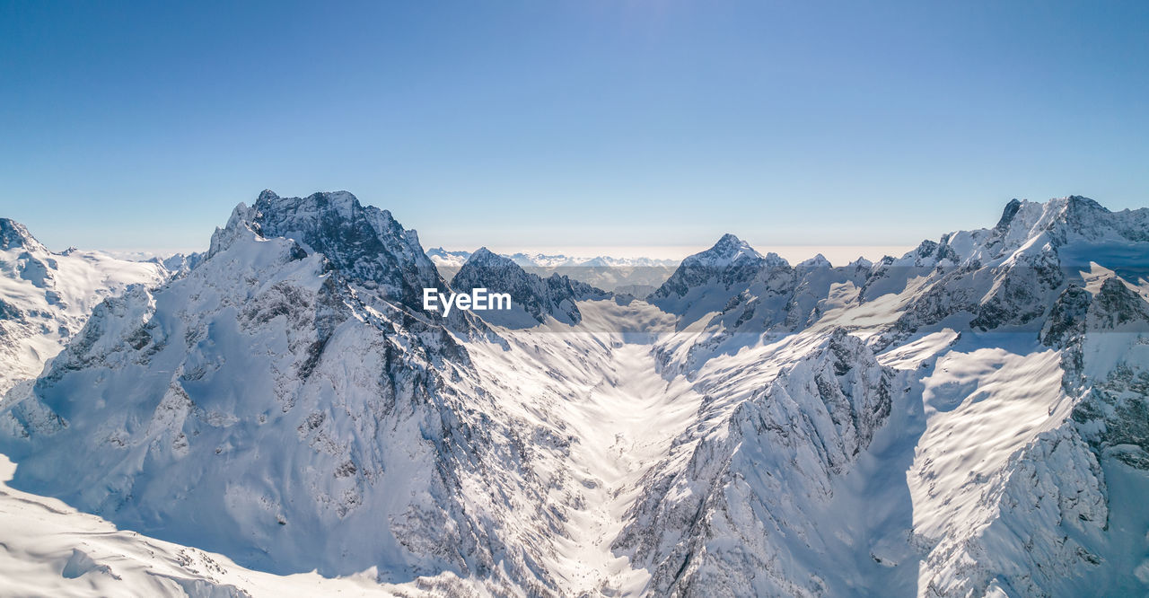 Amazing view of the high mountains covered with snow