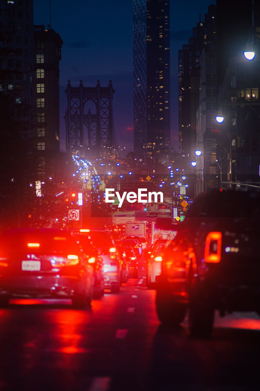 close-up of illuminated city street at night