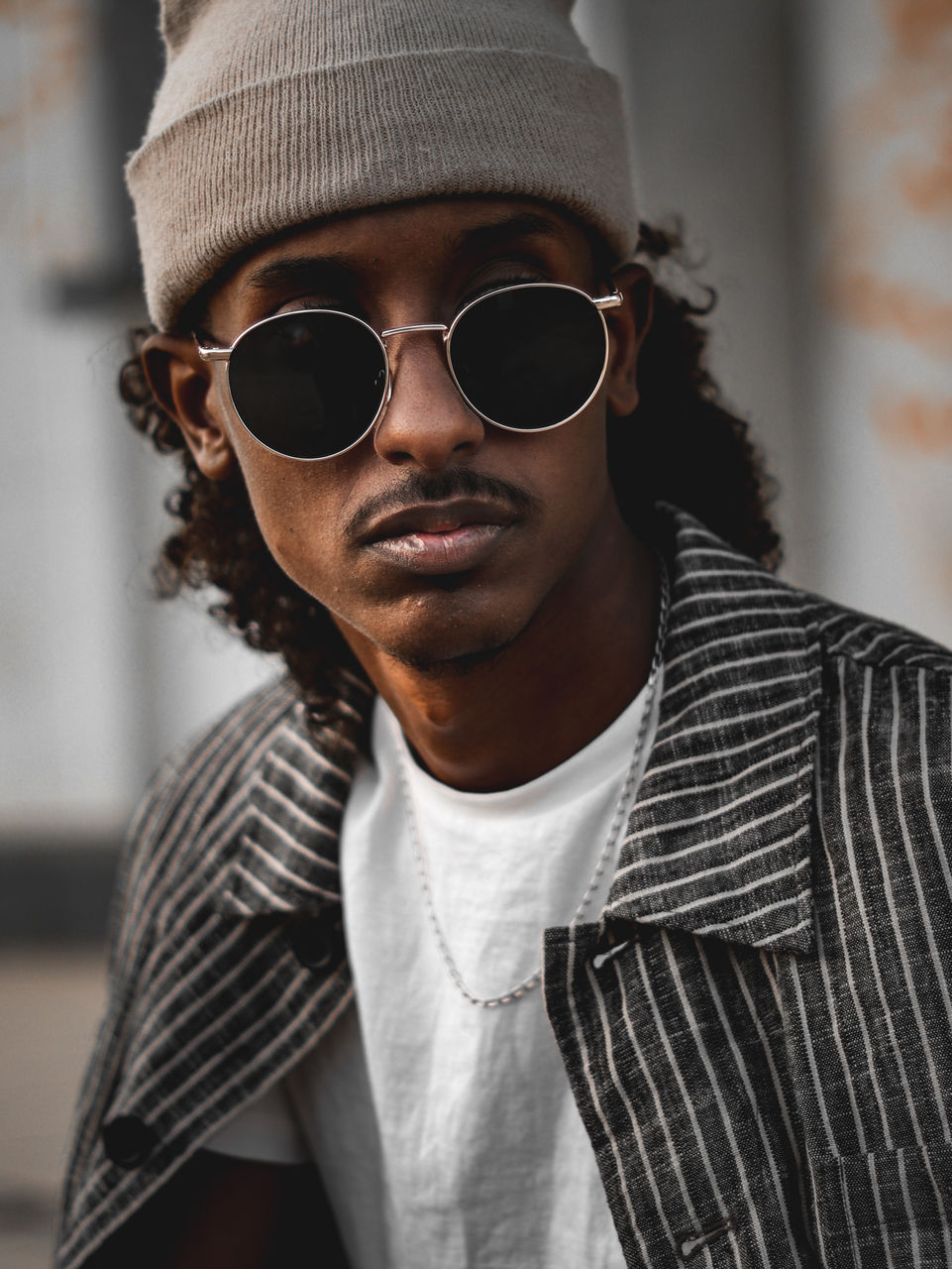 Portrait of young man wearing sunglasses