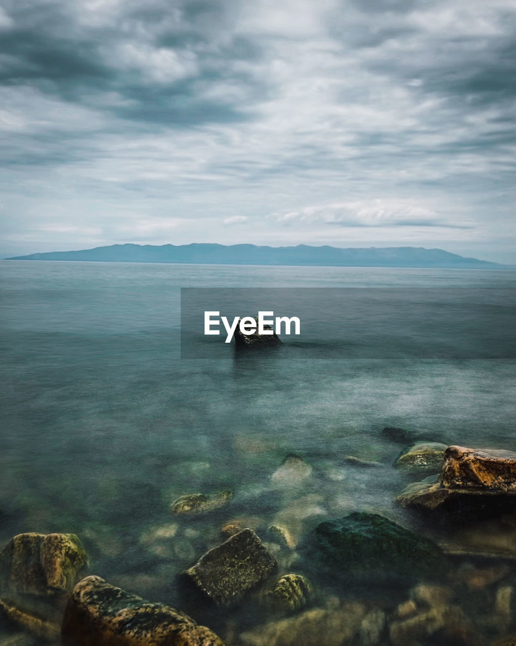 SCENIC VIEW OF SEA AND ROCKS