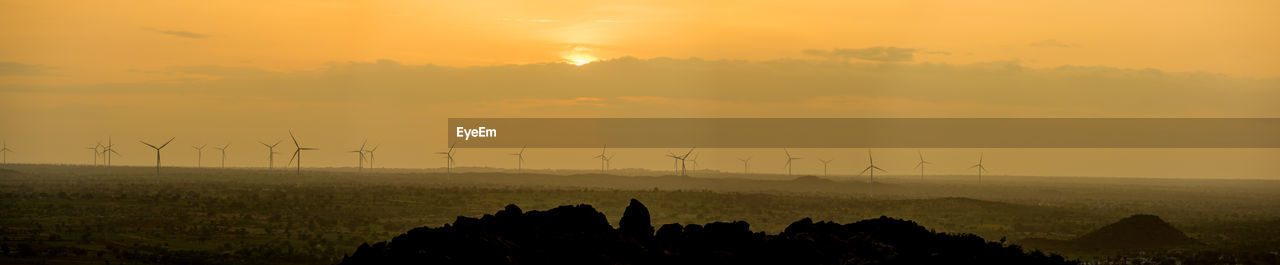 SCENIC VIEW OF LANDSCAPE DURING SUNSET