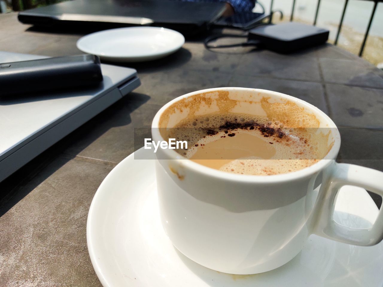 High angle view of coffee cup on table