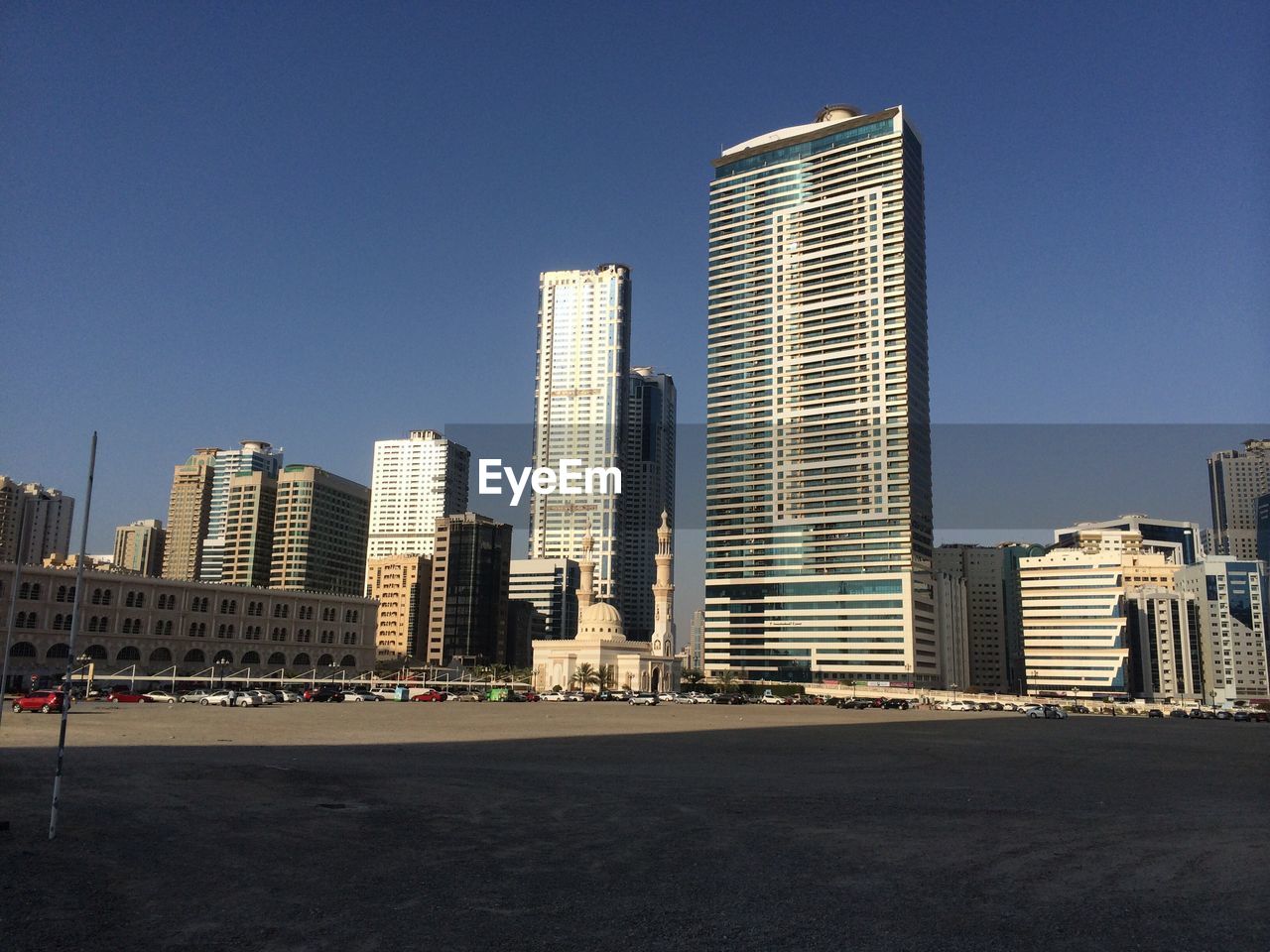 MODERN BUILDINGS IN CITY AGAINST CLEAR SKY