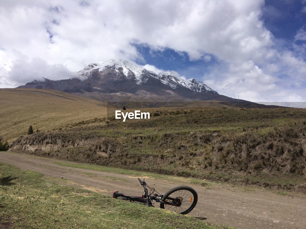 Cycle on dirt track on field