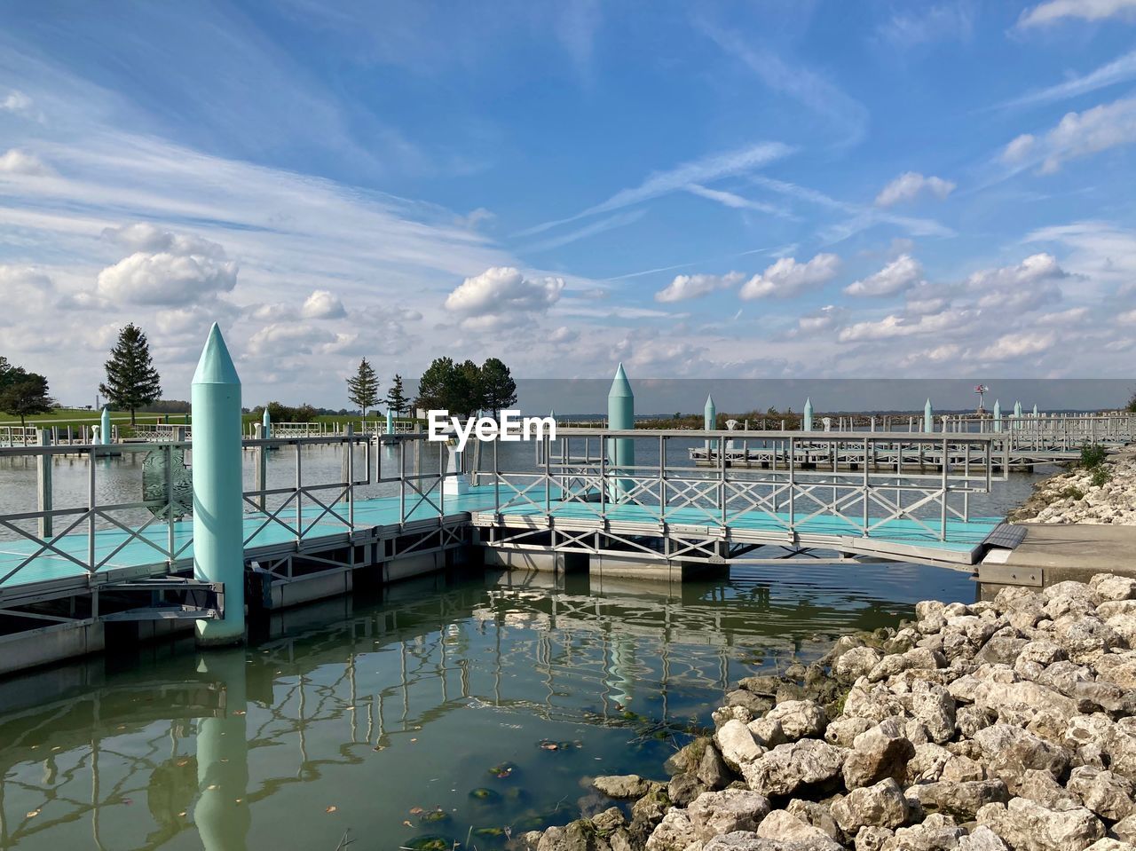 BOATS IN SWIMMING POOL AGAINST SKY