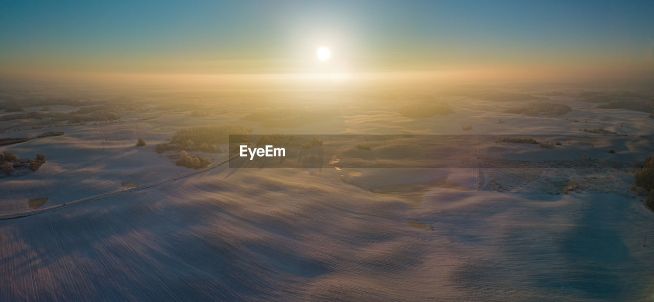 scenic view of sea against sky at dusk