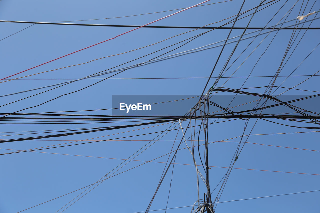 LOW ANGLE VIEW OF ELECTRICITY PYLON AGAINST SKY