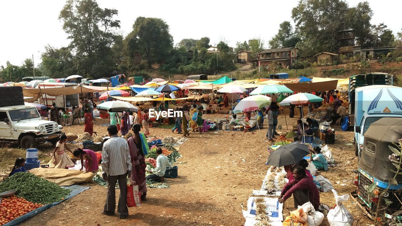 GROUP OF PEOPLE ON THE GROUND