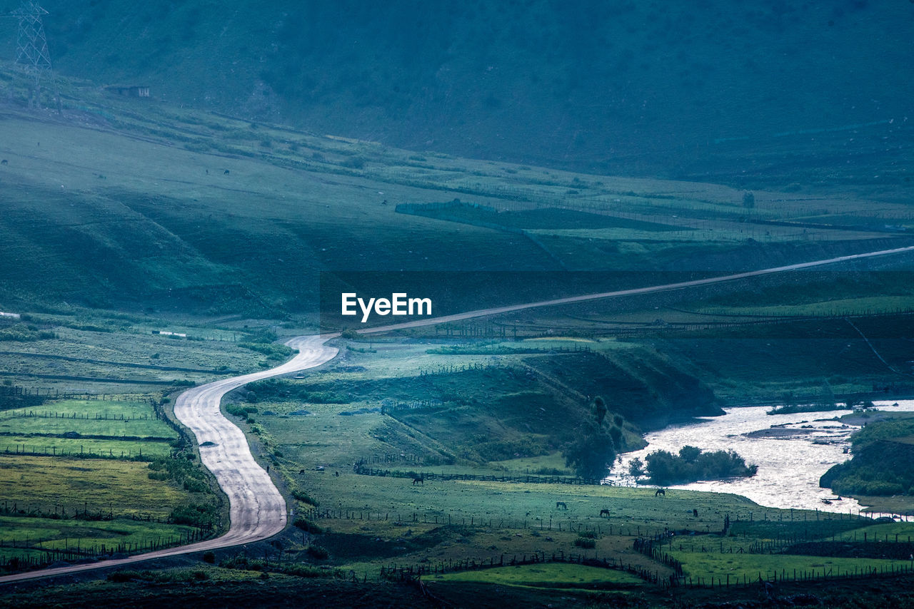 High angle view of road amidst land