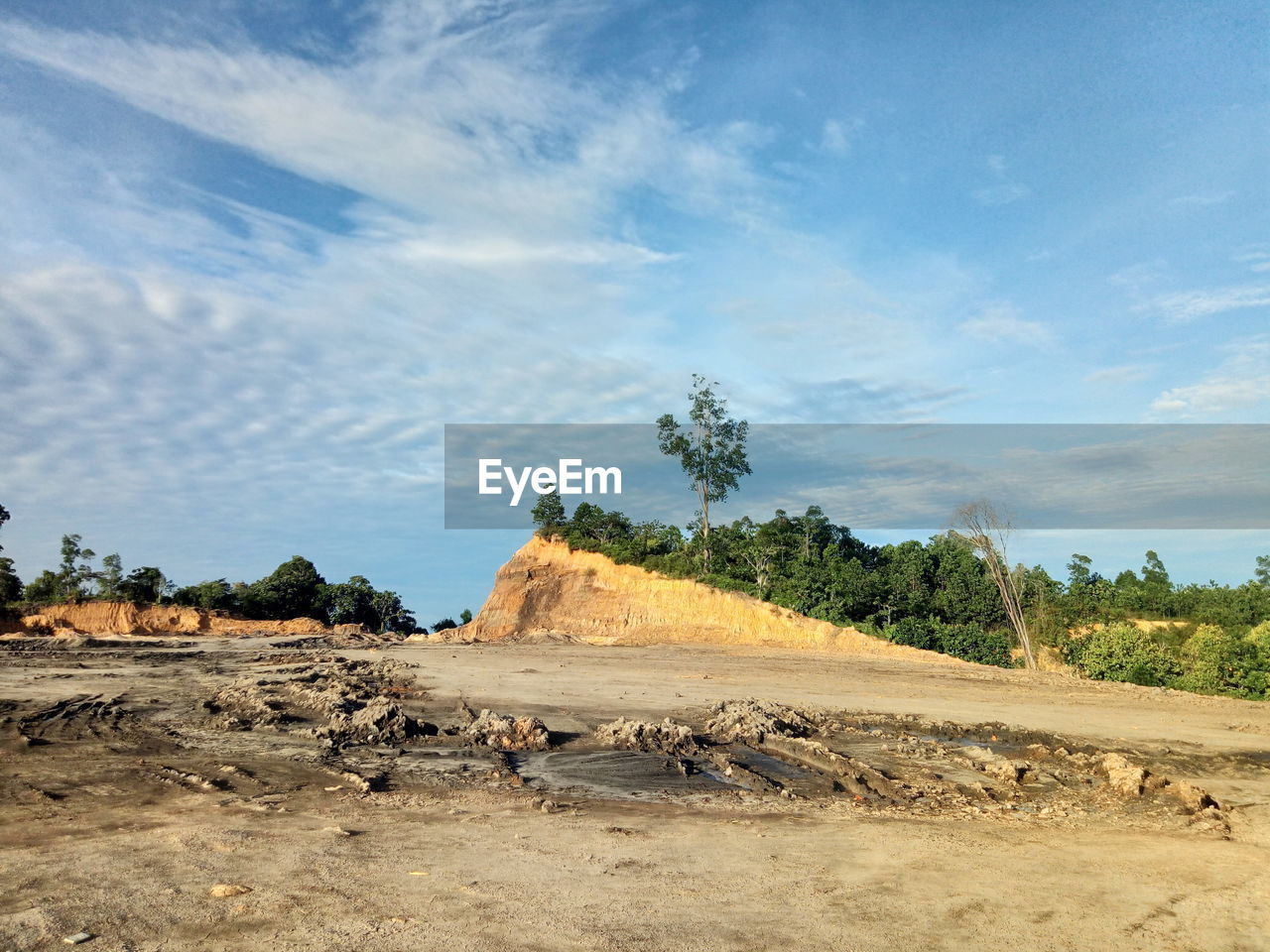 Scenic view of land against sky