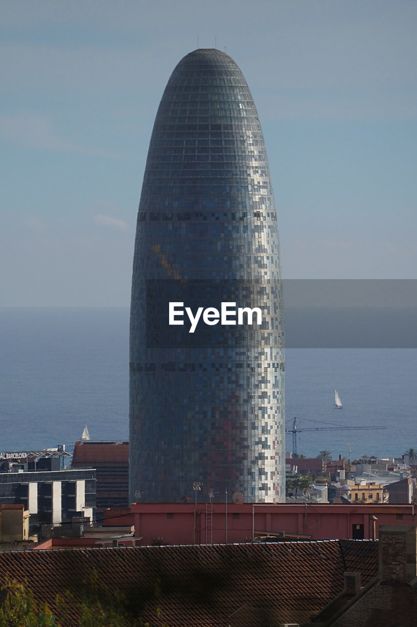 MODERN BUILDINGS AGAINST SKY