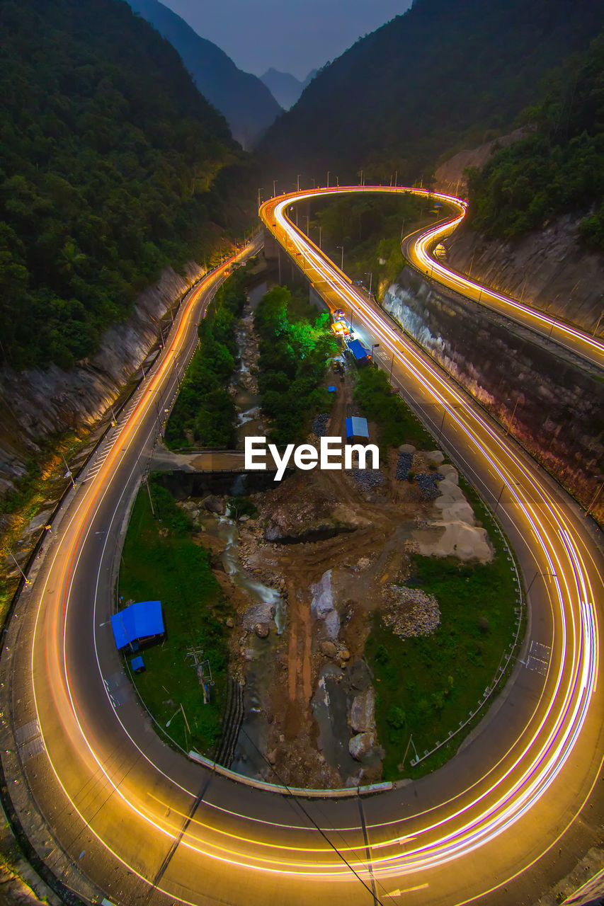 High angle view of light trails on road