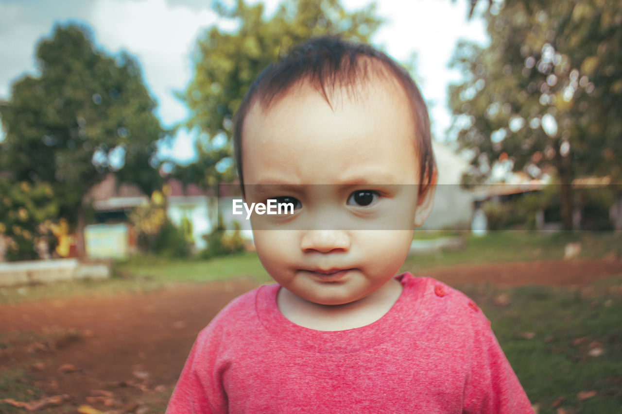 CLOSE-UP PORTRAIT OF CUTE BABY GIRL