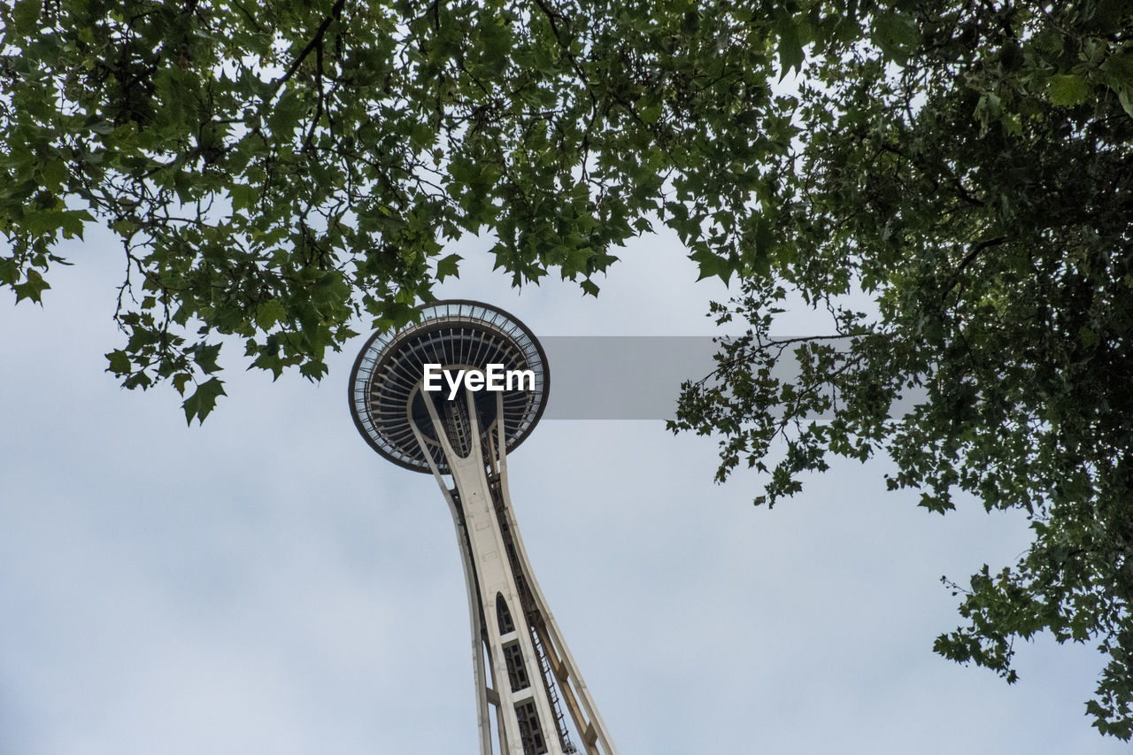 LOW ANGLE VIEW OF TOWER AGAINST CLOUDY SKY