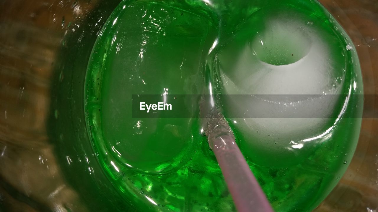 CLOSE-UP OF DRINK ON TABLE