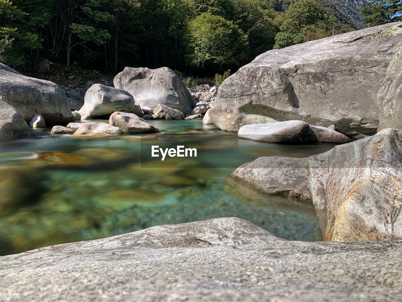 ROCKS BY RIVER