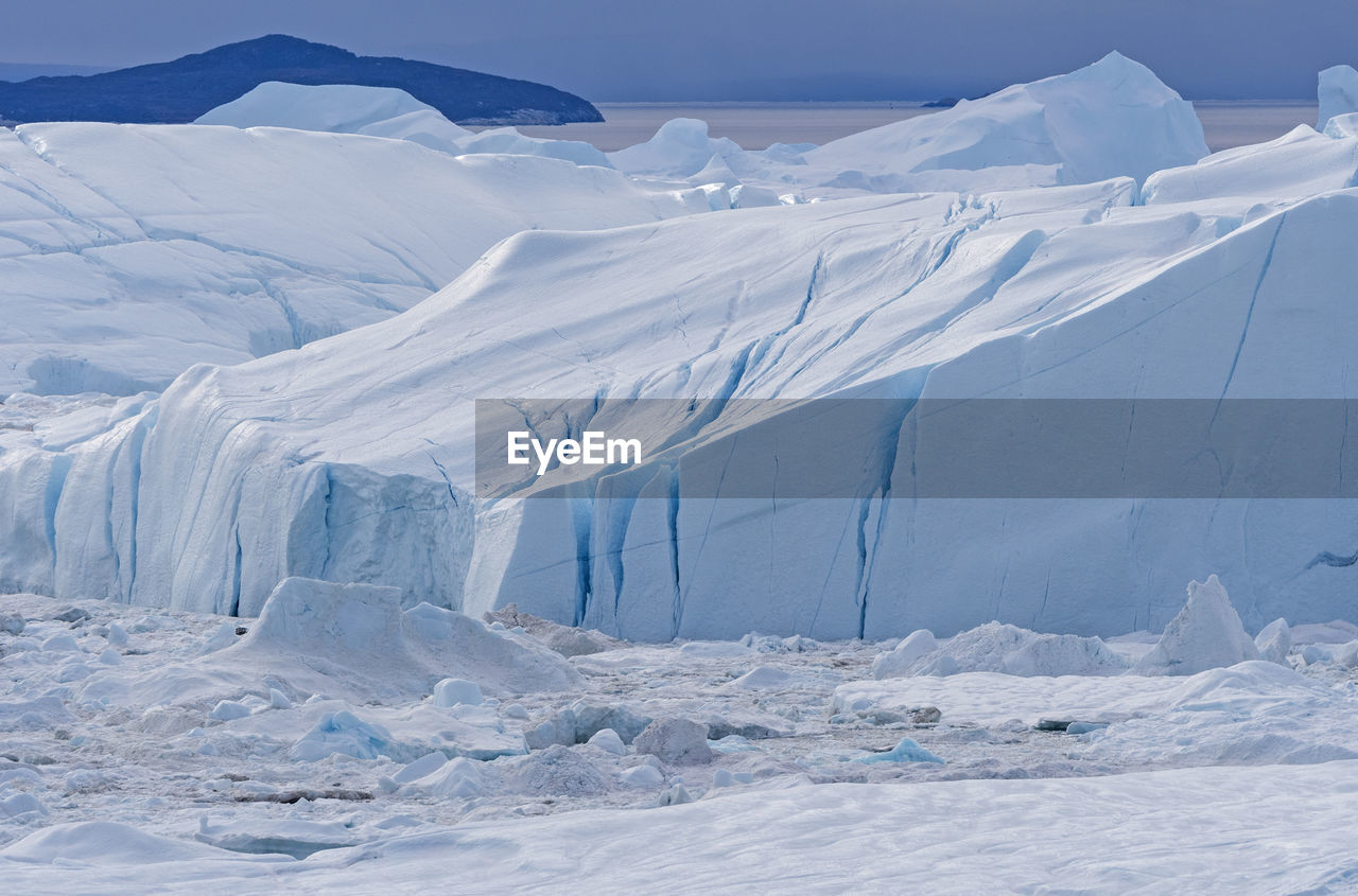Icebergs frozen in the icefjord of the icefjord of ilulissat, greenland