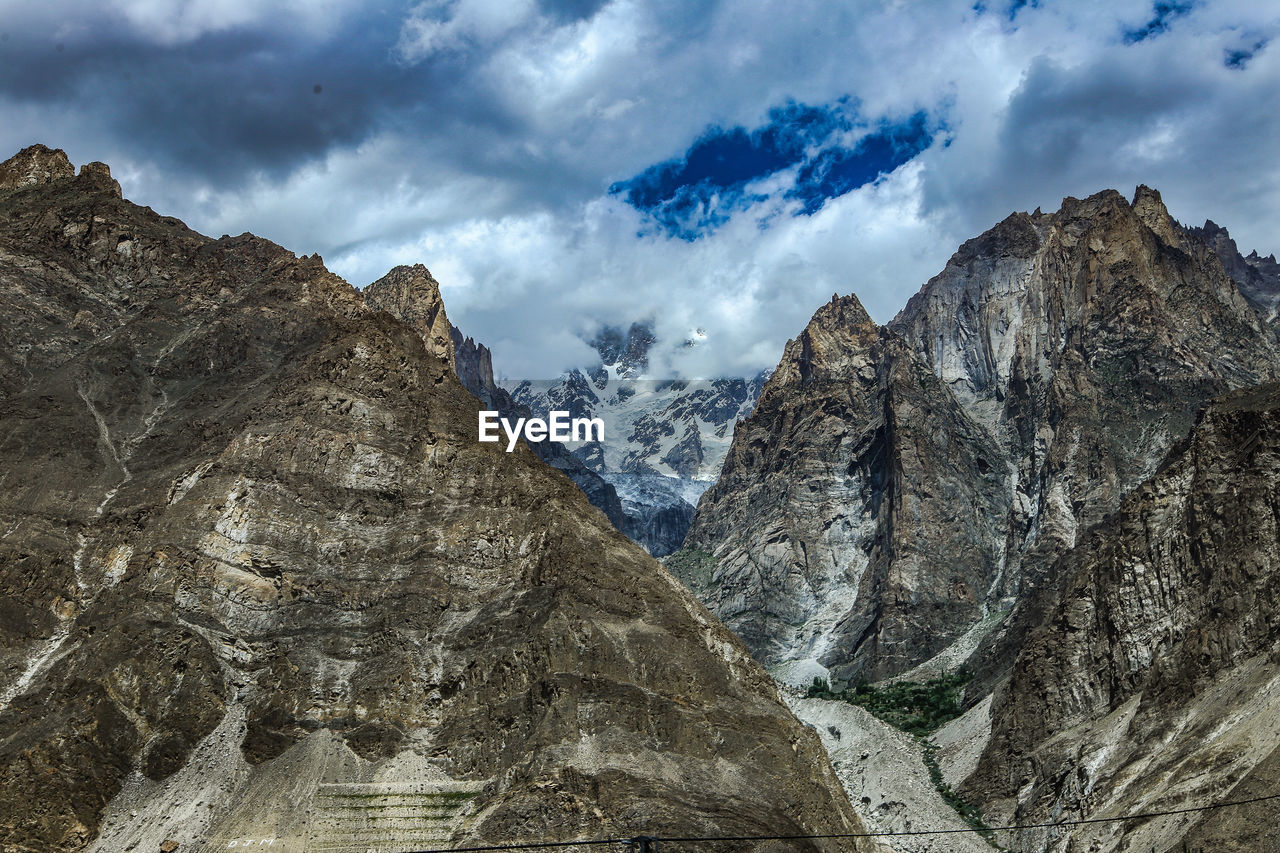 Low angle view of rocks against sky