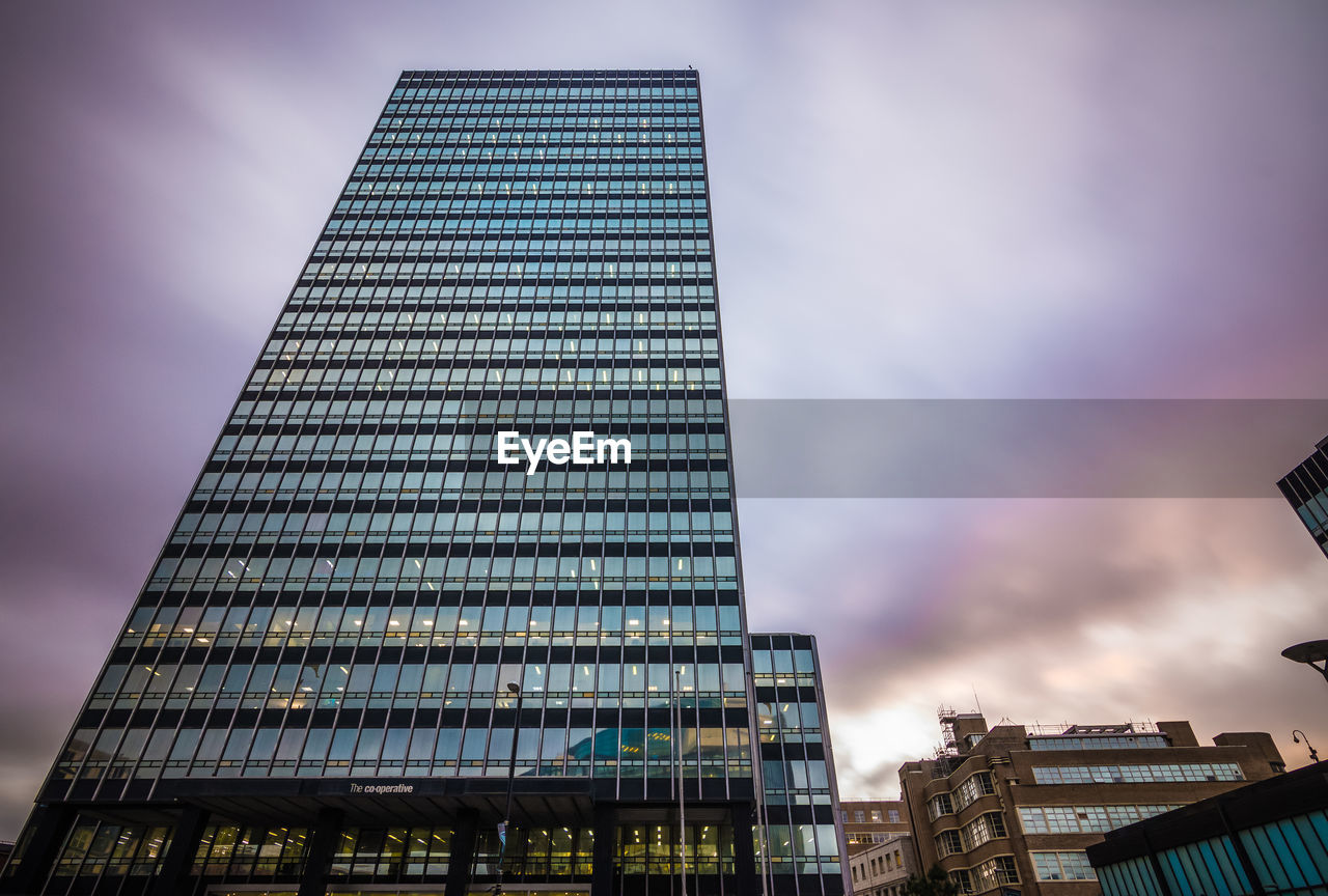 Low angle view of modern building against sky