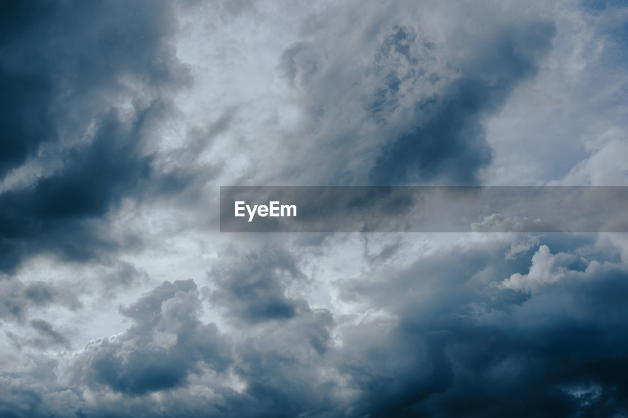 Low angle view of dramatic clouds in sky