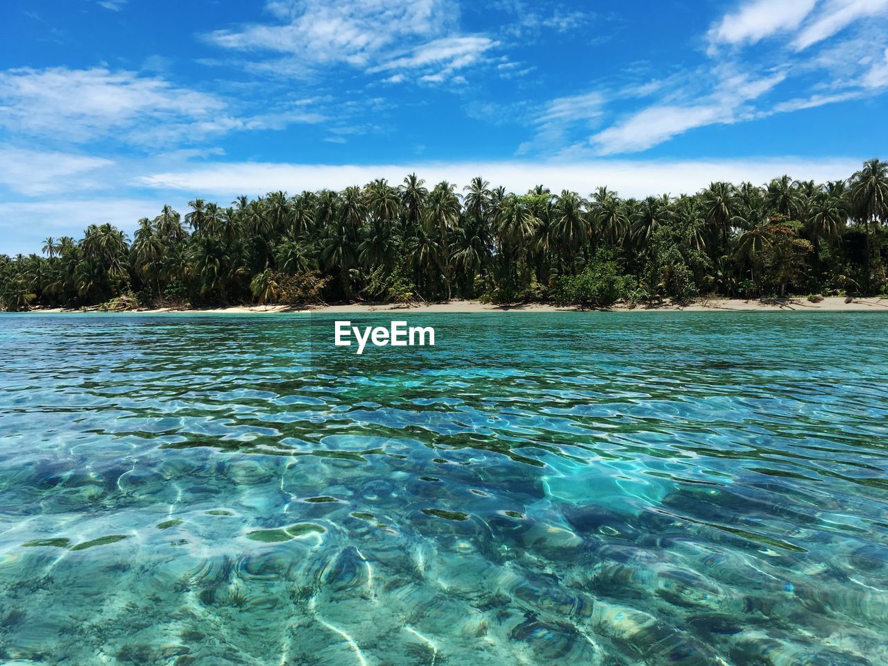 Scenic view of blue sea against sky