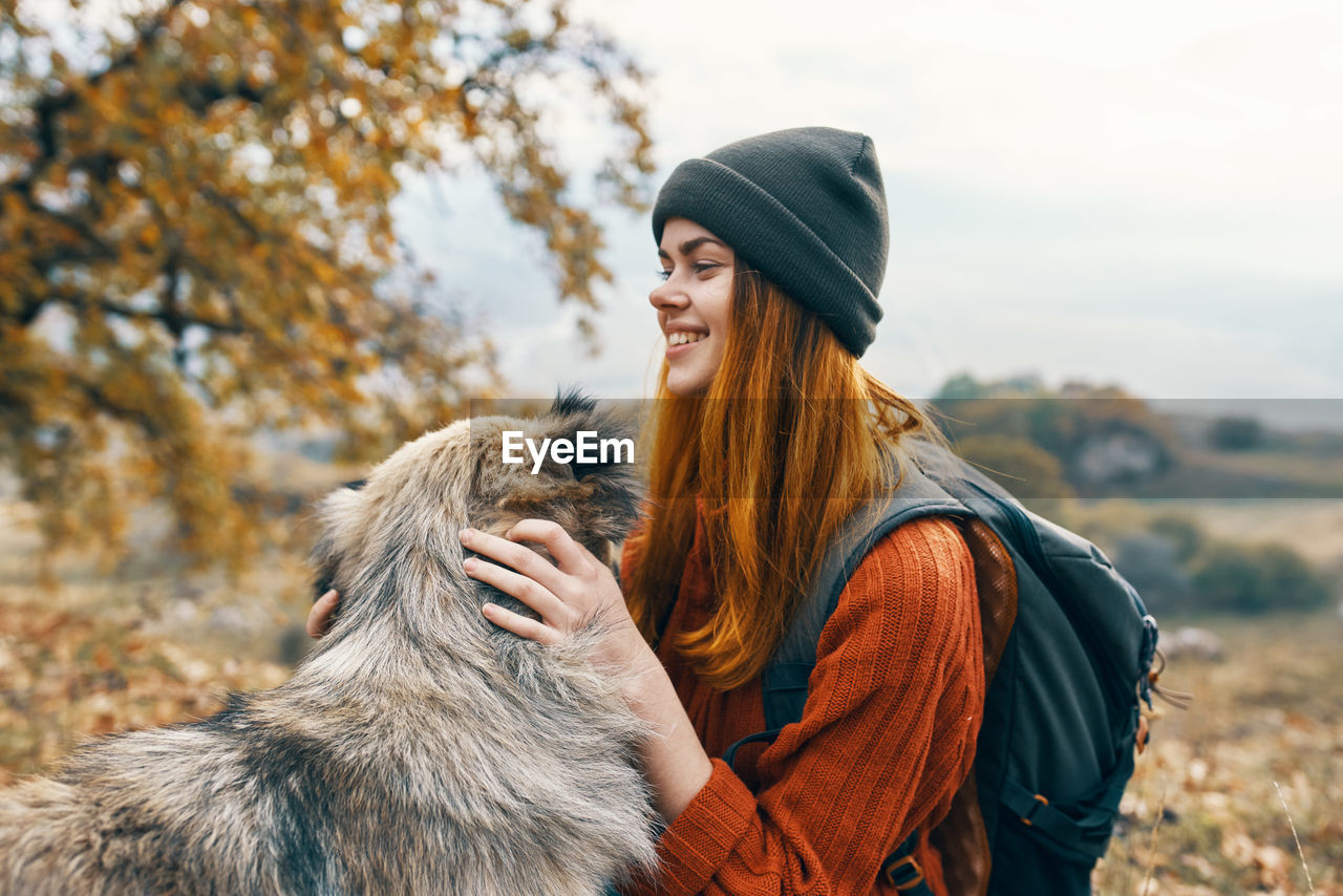 WOMAN WEARING HAT IN PARK