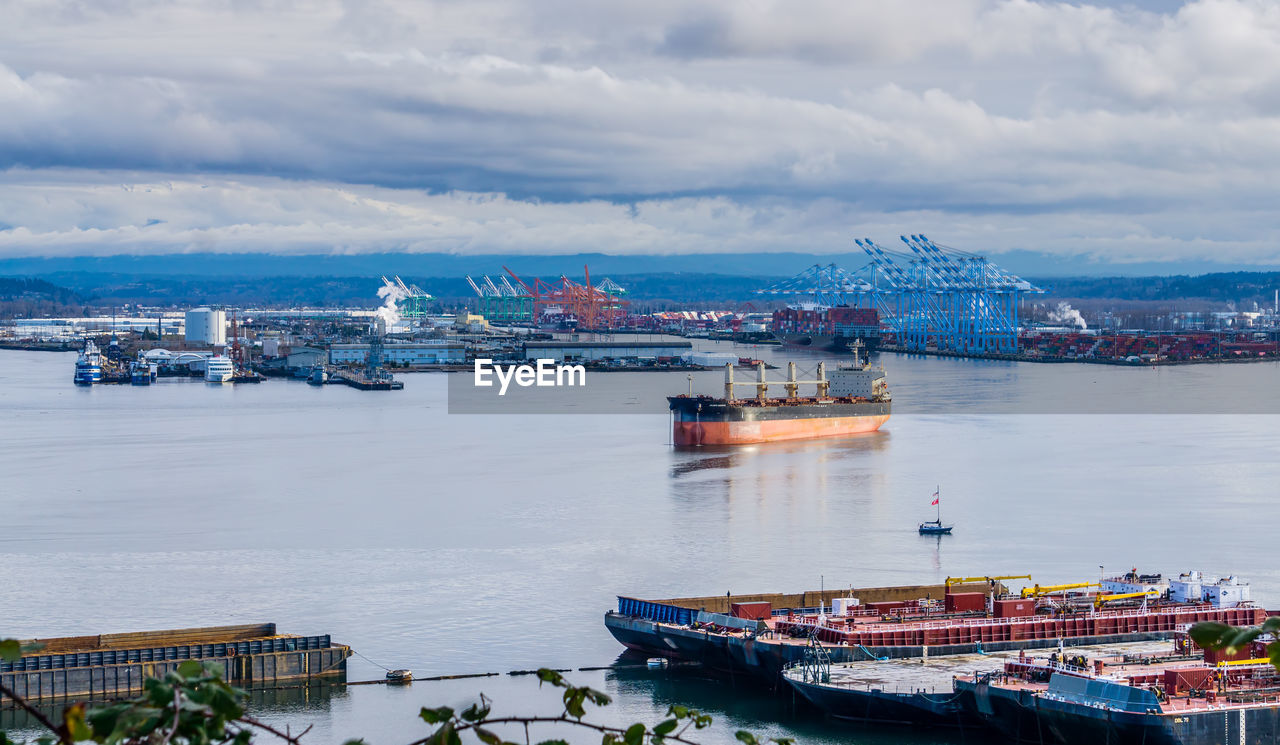 Scenic port of tacoma with ships and cranes.