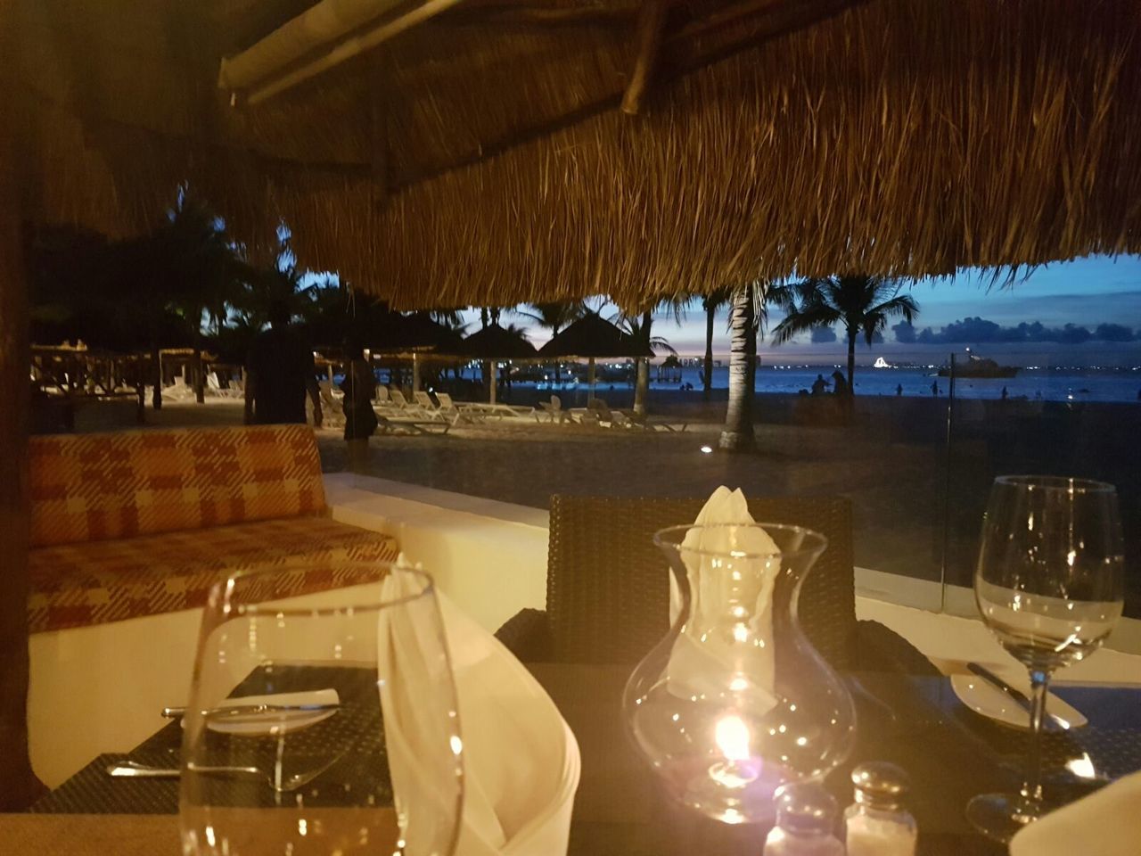 EMPTY CHAIRS AND TABLES AT RESTAURANT