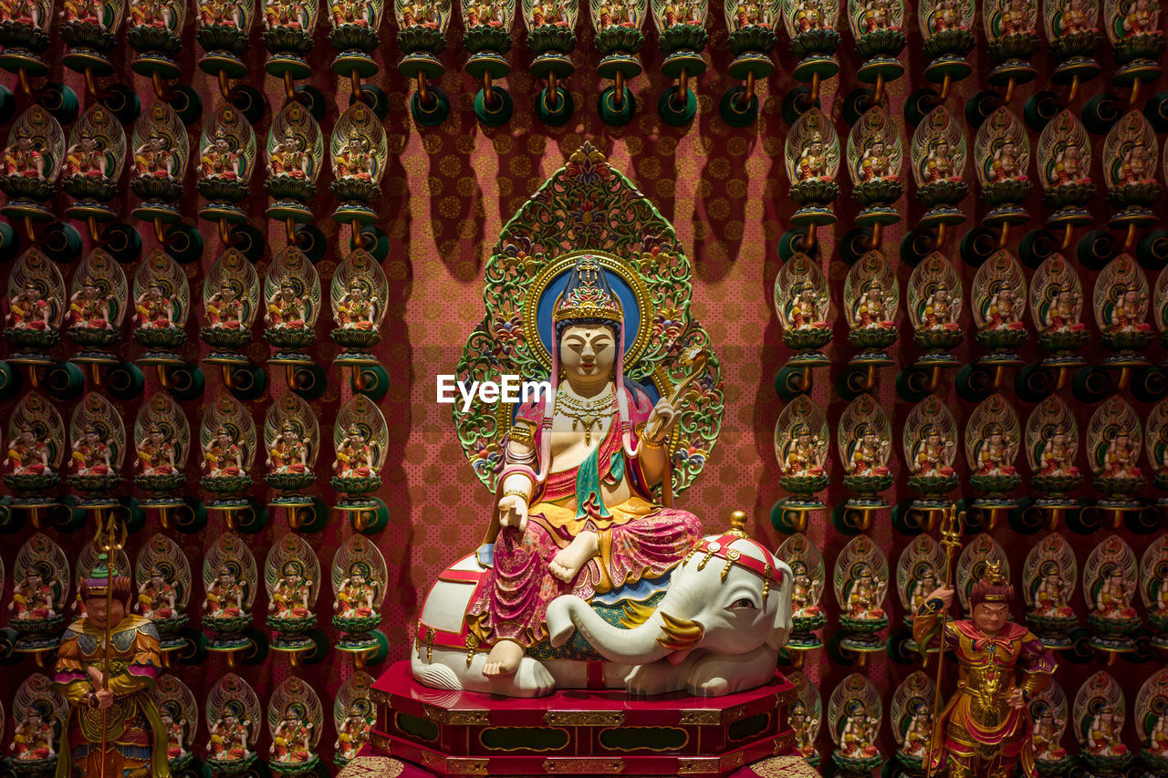 Close-up of idol in temple 