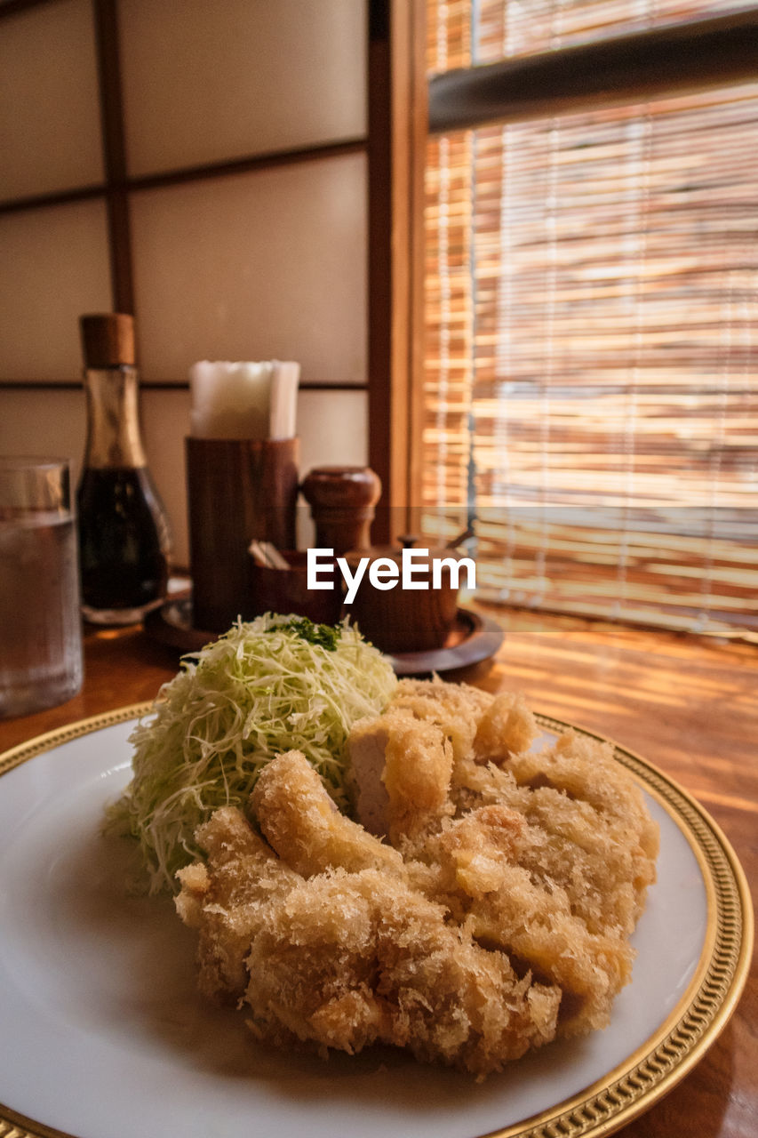 Close-up of food in plate on table