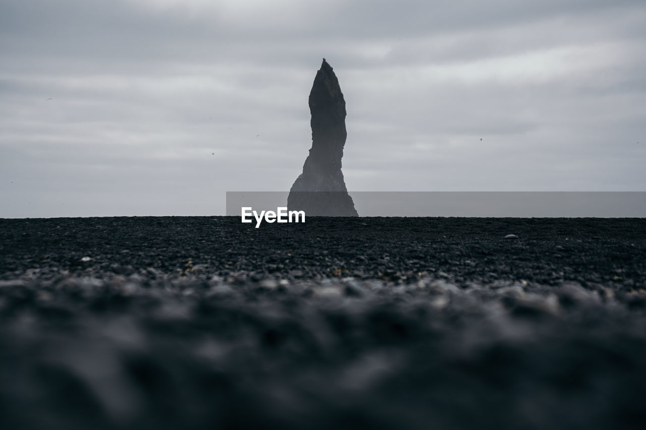 Amazing sight at a cloudy day from black sand beach, iceland